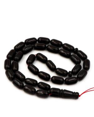 Black misbah capsule from amber