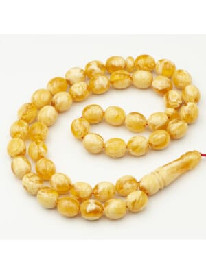 White amber misbaha in egg shape