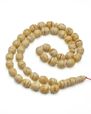 White amber tiger in egg shape